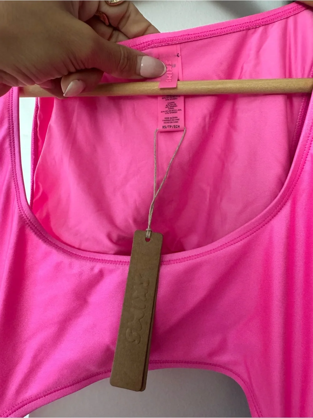 SKIMS Neon Pink Cutout One-Piece Swim Romper